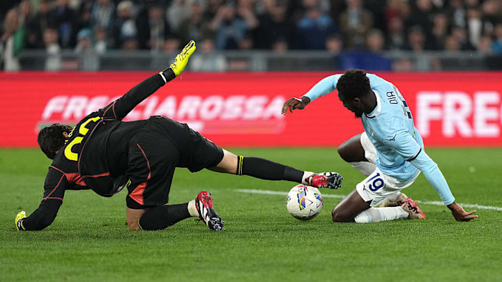 Mile Svilar of AS Roma and Boulaye Dia of SS Lazio during...