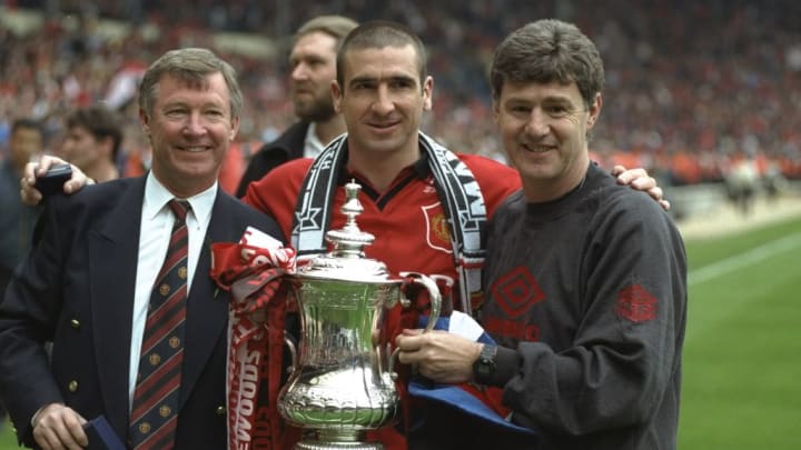 Alex Ferguson, Eric Cantona and Brian Kidd of Manchester United
