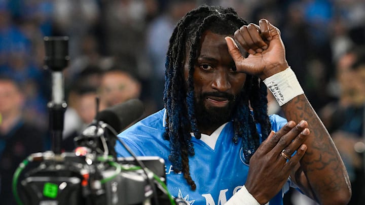 Andre-Frank Anguissa of SSC Napoli celebrates remembering a...
