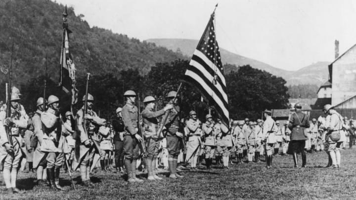 American soldiers in Alsace carrying their flag during WWI