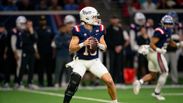 FRISCO, TX - FEBRUARY 01: East Team quarterback Jack Plummer (18) of UCF drops back to pass during the East-West Shrine Bowl game on February 1, 2024 at the Ford Center at the star in Frisco, TX.