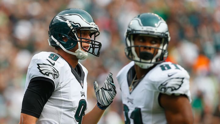 PHILADELPHIA, PA - SEPTEMBER 21: Nick Foles #9 of the Philadelphia Eagles looks on alongside teammate Jordan Matthews #81 in the first half of the game against the Washington Redskins at Lincoln Financial Field on September 21, 2014 in Philadelphia, Pennsylvania.