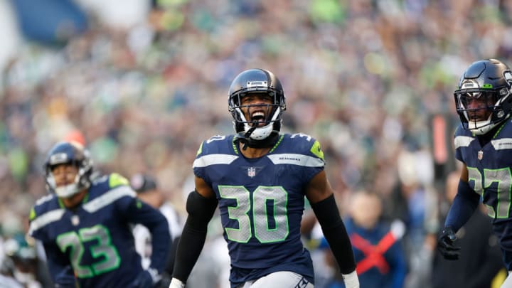 SEATTLE, WASHINGTON - JANUARY 01: Mike Jackson #30 of the Seattle Seahawks celebrates after an interception during the fourth quarter in the game against the New York Jets at Lumen Field on January 01, 2023 in Seattle, Washington.