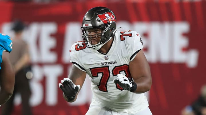 TAMPA, FL - AUGUST 23: Tampa Bay Buccaneers Offensive Lineman Brandon Walton (73) pass blocks during the preseason game between the Miami Dolphins and the Tampa Bay Buccaneers on August 23, 2024 at Raymond James Stadium in Tampa, Florida.