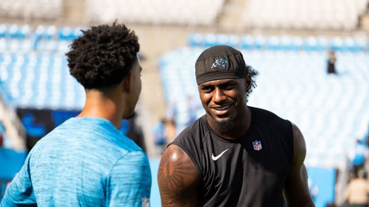 CHARLOTTE, NORTH CAROLINA - AUGUST 17: Xavier Legette #17 of the Carolina Panthers warms up with Bryce Young #9 of the Carolina Panthers before a preseason game against the New York Jets at Bank of America Stadium on August 17, 2024 in Charlotte, North Carolina.