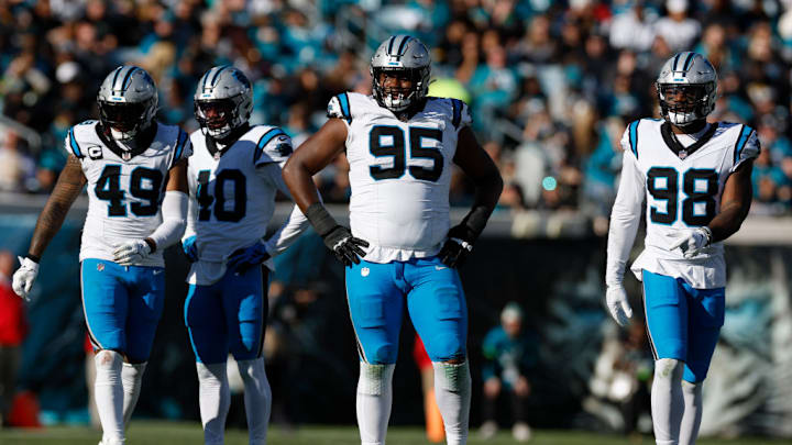 JACKSONVILLE, FL - DECEMBER 31: Carolina Panthers defensive tackle Derrick Brown (95) lines up for a play during the game between the Jacksonville Jaguars and the Carolina Panthers on December 31, 2023 at EverBank Stadium in Jacksonville, Fl.