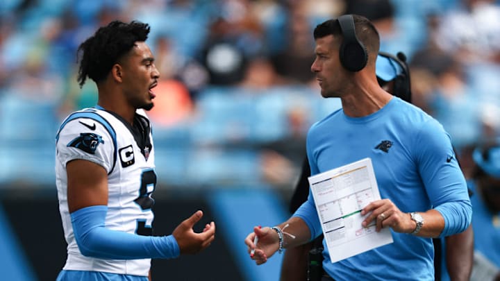 CHARLOTTE, NORTH CAROLINA - SEPTEMBER 15: Quarterback Bryce Young #9 talks with head coach Dave Canales of the Carolina Panthers talks with at Bank of America Stadium on September 15, 2024 in Charlotte, North Carolina.