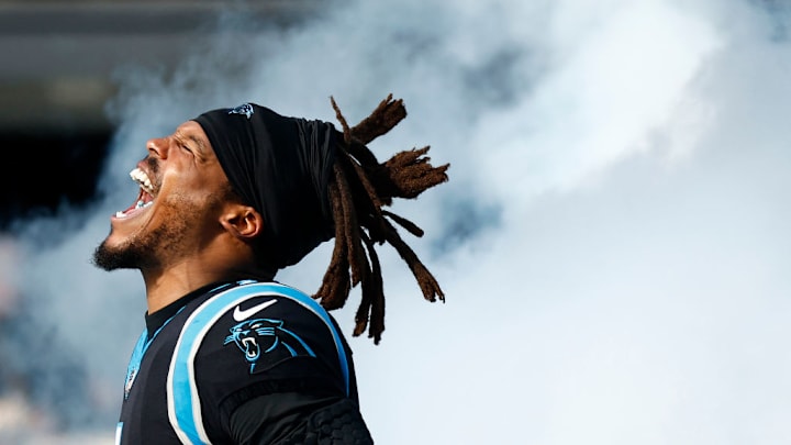 CHARLOTTE, NORTH CAROLINA - DECEMBER 26: Cam Newton #1 of the Carolina Panthers is introduced prior to the first half of the game against the Tampa Bay Buccaneers at Bank of America Stadium on December 26, 2021 in Charlotte, North Carolina. CHARLOTTE, NORTH CAROLINA - DECEMBER 26: Cam Newton #1 of the Carolina Panthers is introduced prior to the first half of the game against the Tampa Bay Buccaneers at Bank of America Stadium on December 26, 2021 in Charlotte, North Carolina.