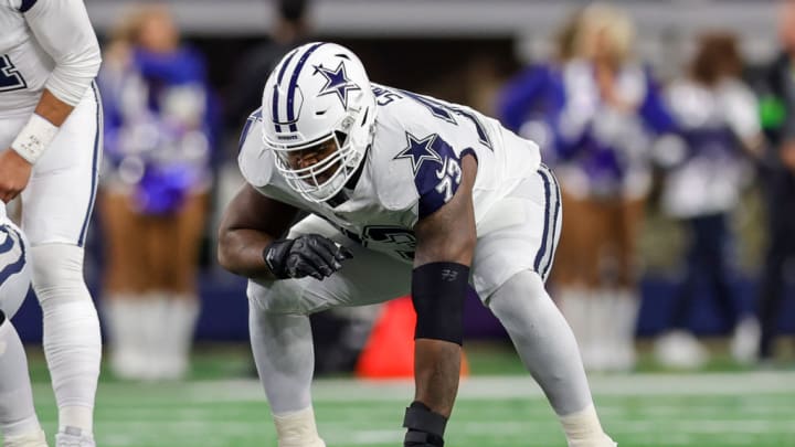 ARLINGTON, TX - DECEMBER 10: Dallas Cowboys offensive tackle Tyler Smith (73) waits for the snap during the game between the Dallas Cowboys and the Philadelphia Eagles on December 10, 2023 at AT&T Stadium in Arlington, Texas.