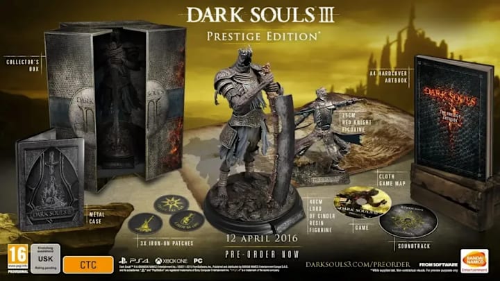 A statue of a large knight with a giant sword next to a copy of the game.