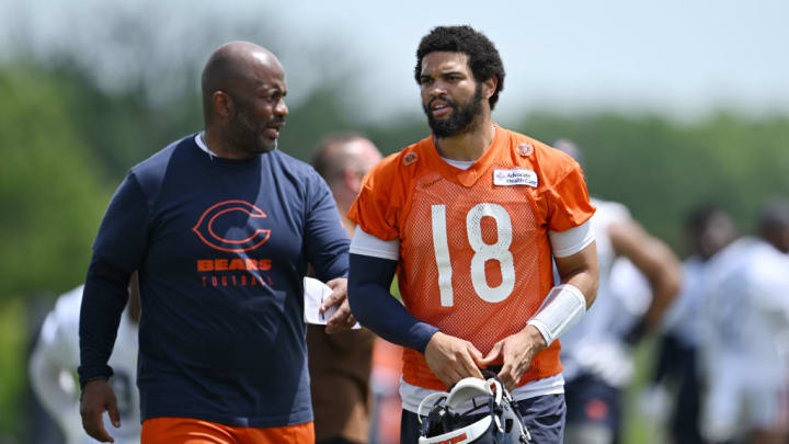 LAKE FOREST, ILLINOIS - JUNE 05: quarterback coach Kerry Joseph and Caleb Williams #18 of the Chicago Bears look on during the Chicago Bears mandatory minicamp at Halas Hall on June 05, 2024 in Lake Forest, Illinois.