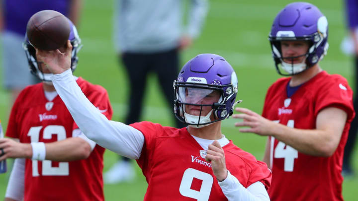 EAGAN, MINNESOTA - JUNE 04: Quarterbacks J.J. McCarthy #9, Sam Darnold #14 and Nick Mullens #12 of the Minnesota Vikings watch the drill during Minnesota Vikings mandatory minicamp at Twin Cities Orthopedics Performance Center on June 04, 2024 in Eagan, Minnesota.