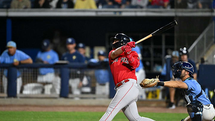 Blaze Jordan swings the bat. Blaze Jordan swings the bat.