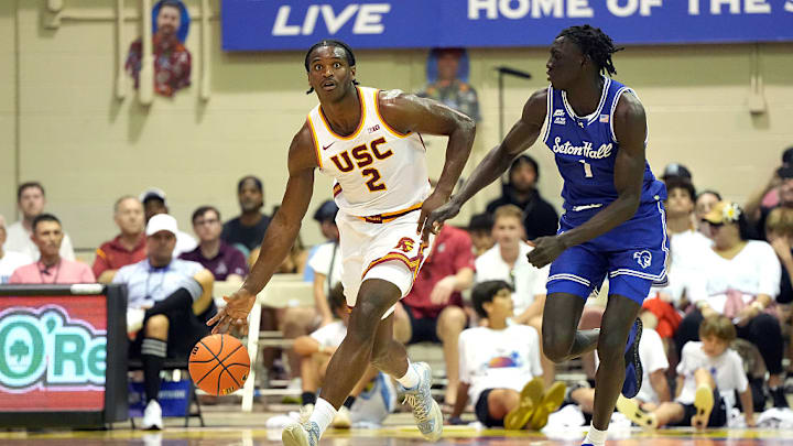 A Maui Invitational Game between Seton Hall and USC significantly delayed the College Football Playoff rankings release.