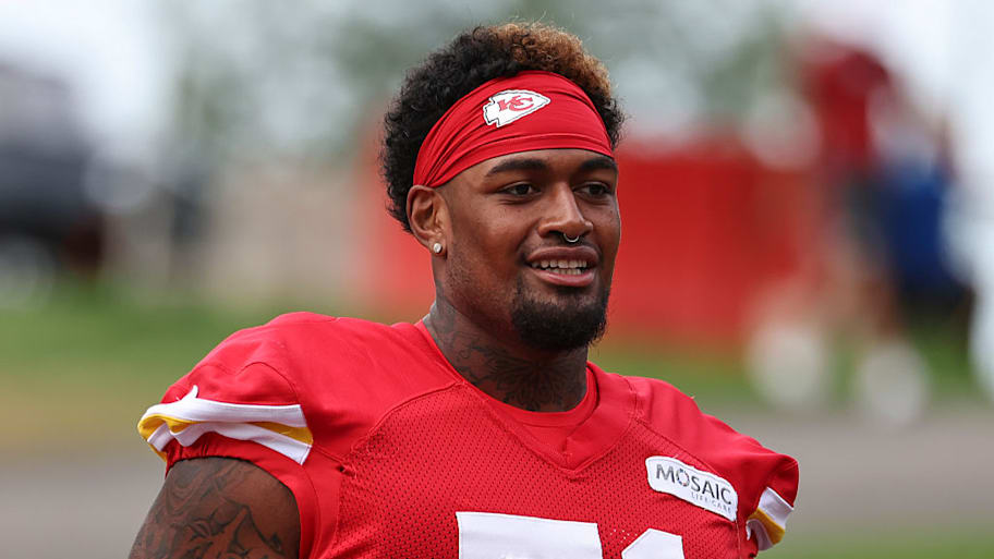 Kansas City Chiefs rookie offensive lineman Josh Simmons looks on.