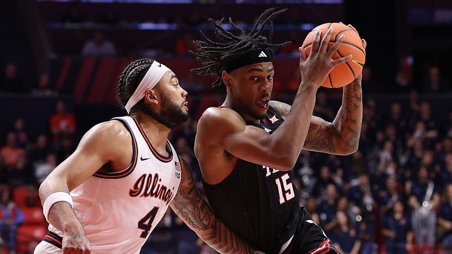 Illinois guard Kylan Boswell defenders Red Raiders forward JT Toppin.