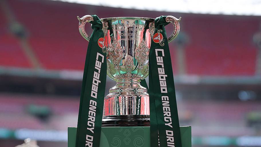 The Carabao Cup trophy is seen on a branded plinth during the Carabao Cup Final match Arsenal and between Manchester City.