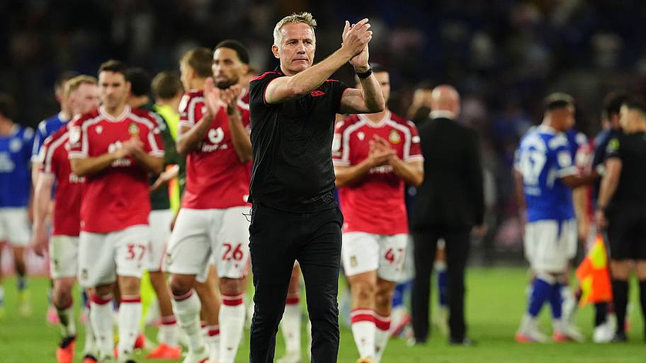 Wrexham manager Phil Parkinson applauds the fans after the final whistle.