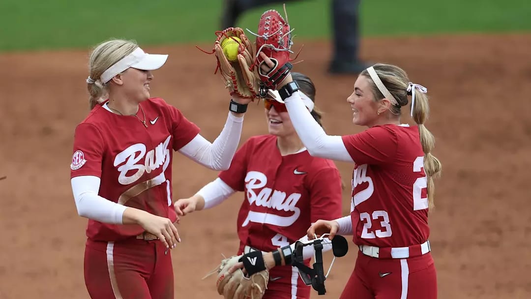 Alabama Softball Player Abby Duchscherer (10), Alabama Softball Player Jocelyn Briski (23), Alabama Softball Player Jena Young (4) celebrate against Ole Miss at Ole Miss Softball Stadium in Oxford, MS on Sunday, Mar 8, 2026.