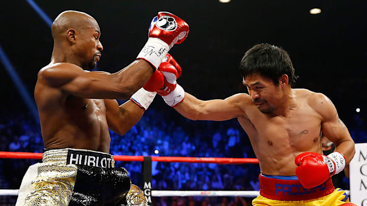 Floyd Mayweather y Manny Pacquiao, durante su combate en 2015. Floyd Mayweather y Manny Pacquiao, durante su combate en 2015.