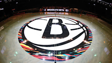 The Brooklyn Nets logo at half court on Dec. 8, 2019.