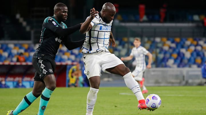 Inter Milan's Belgian forward Romelu Lukaku fights for the...