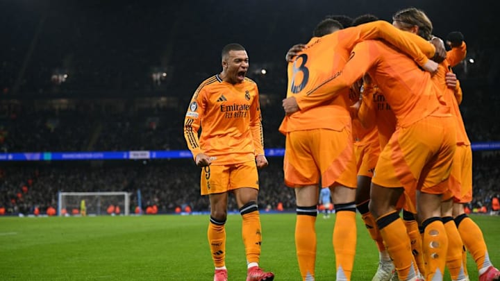 TOPSHOT-FBL-EUR-C1-MAN CITY-REAL MADRID