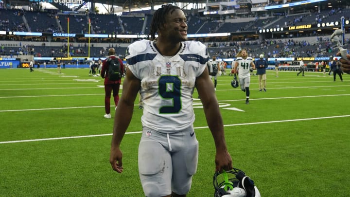 Seattle Seahawks RB Kenneth Walker had a hilarious exchange with a salty Los Angeles Chargers fan during their Week 7 game.