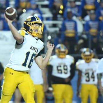 Winter Haven's John Kostuch (16) throws against Auburndale during their game at Bruce Canova Stadium in Auburndale, Fl on Friday November 1, 2024. Scott Wheeler | PhotoAuburndale's (0) tackles Winter Haven's (16) during their game at Bruce Canova Stadium in Auburndale, Fl on Friday November 1, 2024. Scott Wheeler | Photo