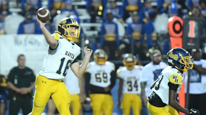 Winter Haven's John Kostuch (16) throws against Auburndale during their game at Bruce Canova Stadium in Auburndale, Fl on Friday November 1, 2024. Scott Wheeler | PhotoAuburndale's (0) tackles Winter Haven's (16) during their game at Bruce Canova Stadium in Auburndale, Fl on Friday November 1, 2024. Scott Wheeler | Photo Winter Haven's John Kostuch (16) throws against Auburndale during their game at Bruce Canova Stadium in Auburndale, Fl on Friday November 1, 2024. Scott Wheeler | PhotoAuburndale's (0) tackles Winter Haven's (16) during their game at Bruce Canova Stadium in Auburndale, Fl on Friday November 1, 2024. Scott Wheeler | Photo