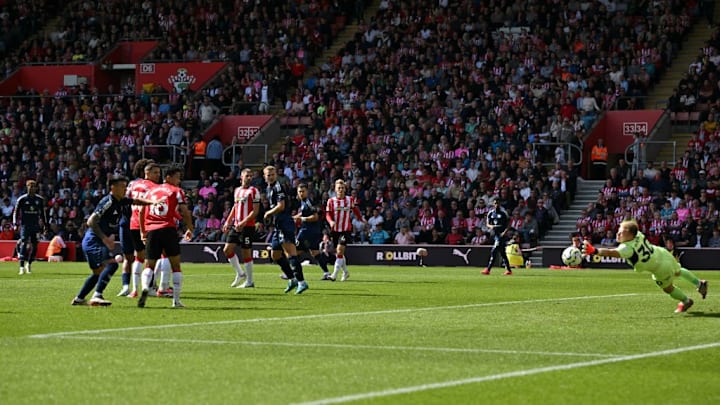 Marcus Rashford's effort bends past Aaron Ramsdale into the far corner