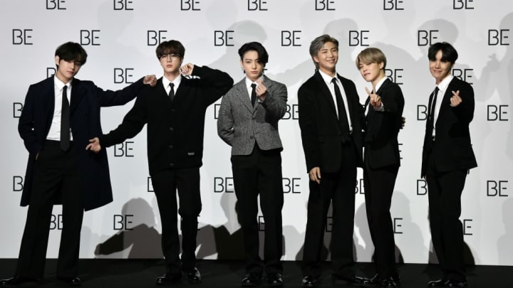 South Korean K-pop boy band BTS members (left to right) V, Jin, Jung Kook, RM, Jimin, and J-Hope pose for a photo session dur