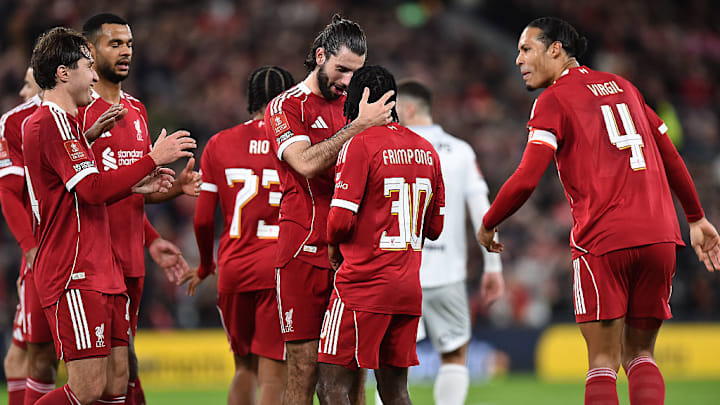 Dominik Szoboszlai and Jeremy Frimpong (middle) got the party started at Anfield. 