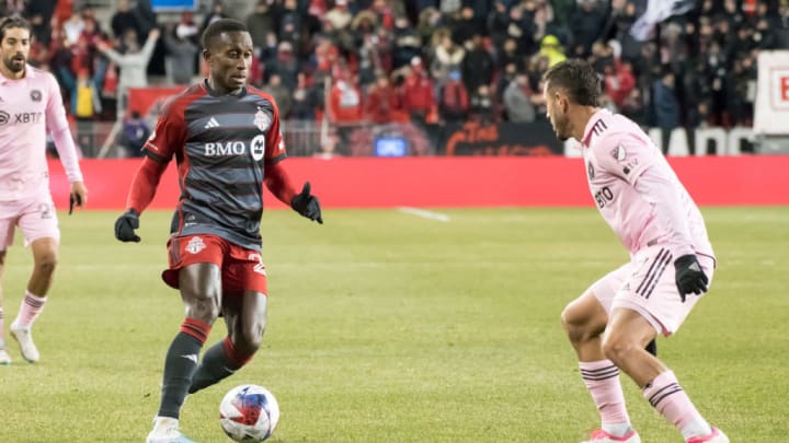 Richie Laryea #22 (L) and Jean Mota #7 (R) seen in action...