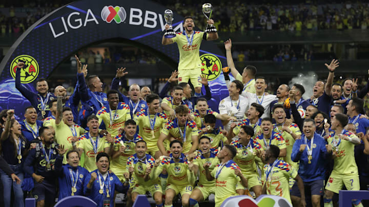 Henry Martín #21, of Club America lifts the Liga MX...