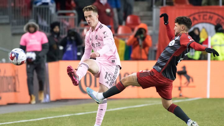 Harvey Neville #18 (L) and Jonathan Osorio #21 (R) seen in...