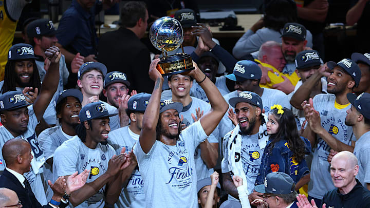 The Indiana Pacers celebrate after winning the Eastern Conference finals.