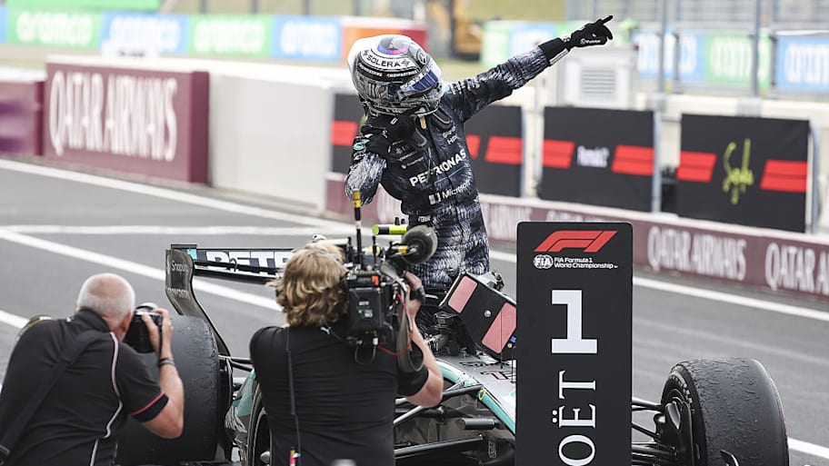Mercedes F1 driver Kimi Antonelli celebrates winning the Japanese Grand Prix.