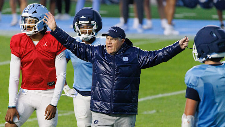 Belichick coaches the Tar Heels during spring football.
