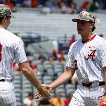 Alabama pitchers Bobby Alcock (left) and Braylon Myers.