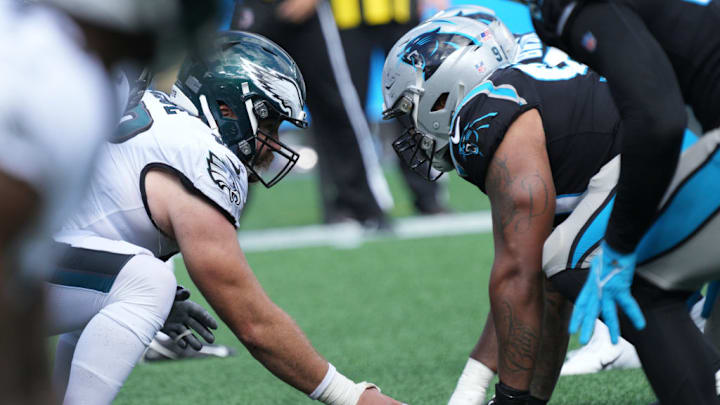 CHARLOTTE, NC - OCTOBER 10: Philadelphia Eagles center Jason Kelce (62) prepares to snap the ball during the game between the Carolina Panthers and the Philadelphia Eagles on October 10, 2021 at Bank of America Stadium in Charlotte, NC. CHARLOTTE, NC - OCTOBER 10: Philadelphia Eagles center Jason Kelce (62) prepares to snap the ball during the game between the Carolina Panthers and the Philadelphia Eagles on October 10, 2021 at Bank of America Stadium in Charlotte, NC.
