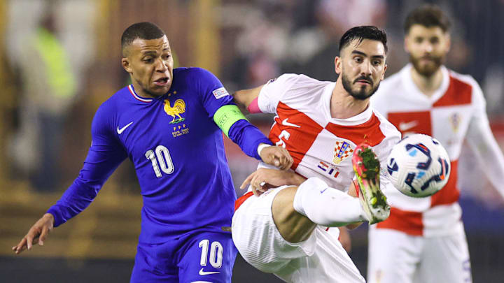 Kylian Mbappe, Josip Sutalo