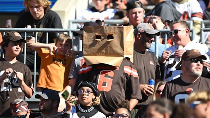 A Cleveland Browns fan wears a bag on his head during a game on October 20, 2024. A Cleveland Browns fan wears a bag on his head during a game on October 20, 2024.