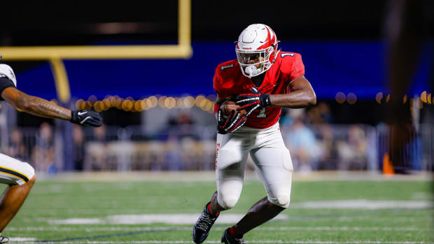 Milton tight end Ethan Barbour running against American Heritage 