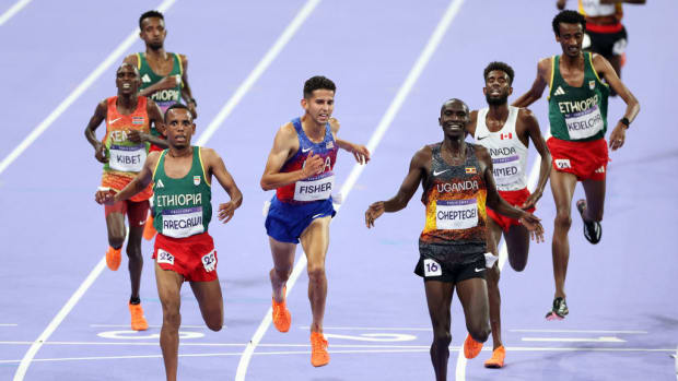 American Grant Fisher finishes the 10,000-meter race at the Paris Olympics, finishing in third. 