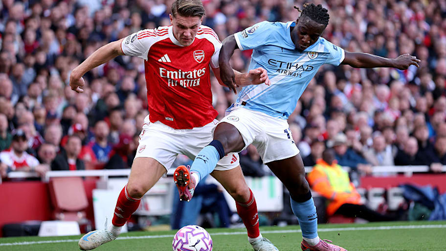 Viktor Gyokeres of Arsenal and Jeremy Doku of Manchester City