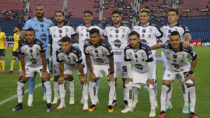 Team Queretaro pose for photos before the 2nd round match of...