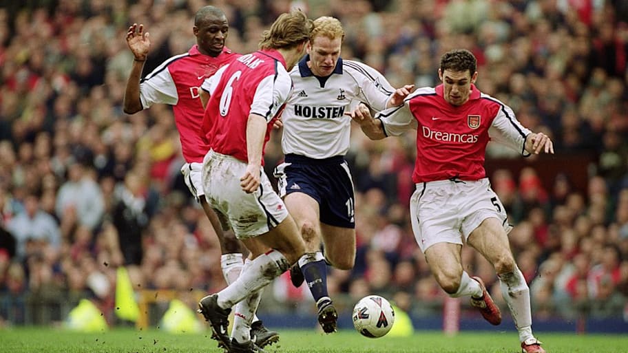 Tony Adams, Patrick Viera and Martin Keown of Arsenal.