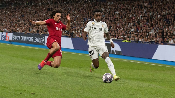 Trent Alexander Arnold (L) and Vinicius Junior (R) during...