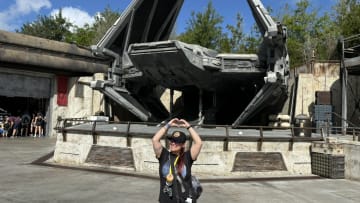 Staff writer Camila Domingues makes her love for the First Order known in front of the First Order TIE echelon at Galaxy's Edge, Disney's Hollywood Studios.